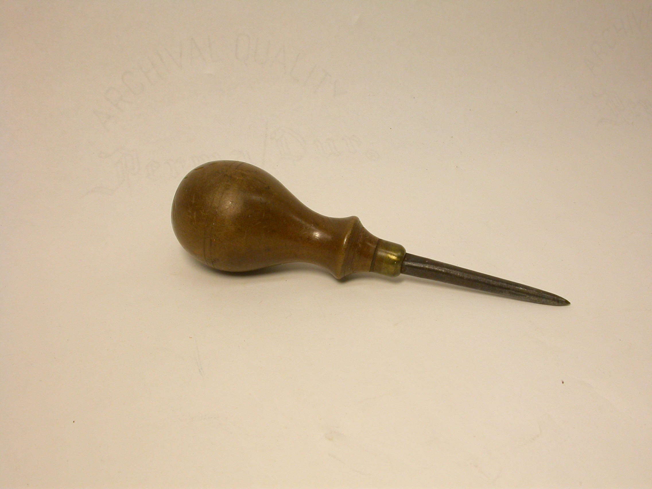 an%20awl%20with%20a%20wooden%20knobbed%20handle